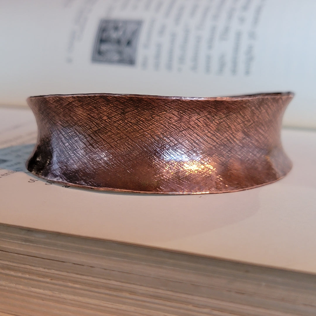 Copper anticlastic cuff with cross hatch detail